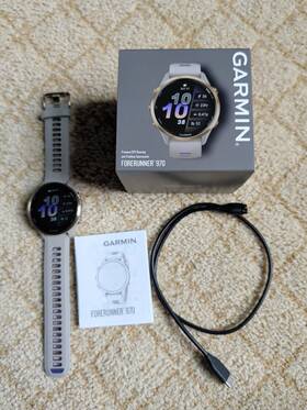 010-02969-02 Garmin Forerunner 970 Gold Titanium Gps Running Watch Indigo Band