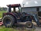 585xl Case Tractor With Quicke Loader Bucket And Fork Attachment