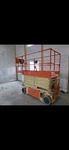 Jlg 3248R Self-propelled Drivable Scissor Lift Orange/beige Equipment. Fixed Price $9900.00.