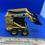 John Deere 6675 Diecast Skid Steer Loader Yellow Black Contemporary Model. Fixed Price $19.99.