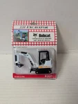 Bobcat X331 Mini Excavator - Wan Ho 1:50 Scale Diecast Model #6900570 New. Fixed Price $29.95.