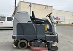 Advance SC6500 45C Ride On Floor Sweeper Scrubber With Charger. Fixed Price $8999.00.