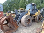 John Deere 624K Loader Solid Wheels & Tires Complete Set. Fixed Price $11595.00.