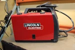 Used Lincoln Electric LE31MP. Fixed Price $429.95.