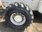 Terex TH528 Right/passenger Tire And Rim - Used. Fixed Price $389.99.