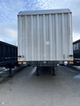 2006 Transcraft 5TH Wheel Flatbed Trailer With Rolling Tarp Cover. Fixed Price $10000.00.