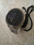 Garmin Forerunner 970 Smartwatch (soft Gold Titanium, French Gray, Indigo Band). Fixed Price $749.99.