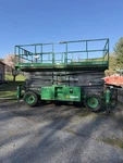 2015 Skyjack SJ9250 4X4 Diesel Scissor Rough Terrain Man Lift Outriggers. Fixed Price $11500.00.