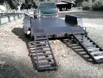 Used 2004 Steel Deck 14' Dovetail Heavy Equipment Trailer. Fixed Price $3995.00.