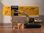 W/ Box Nzg #367 Caterpillar Excavator 1:50 Scale Germany. Fixed Price $89.95.