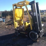 4 Tires And Wheels Hyster E50XN-33 Electric Forklift. Fixed Price $450.00.