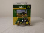 1/64 John Deere 6210R Tractor With Front Wheel Assist & Loader. Fixed Price $45.00.