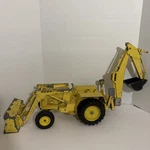 Vintage - Ertl Ford 7500 Tractor W/long Backhoe & Front Loader Diecast Metal. Fixed Price $49.99.