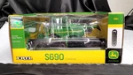 John Deere "authentics # 3" S690 Combine ... 1/64 Scale W/both Heads Nib. Fixed Price $125.00.