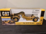 Norscot #55699 1/50 Scale Caterpillar 631E Wheel Tractor Scraper Unused W/box!. Fixed Price $49.49.