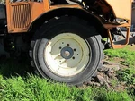 2 Wheels And Tires For Holder C9700H Tractor. Fixed Price $200.00.