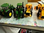 2JOHN Deere Tractors Wheel Loaders, No Packaging # C524. Fixed Price $15.00.