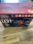 Lincoln Electric LE31MP Multi-process Welder Black/red (K3461-1). Fixed Price $875.00.