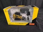 Norscot Cat 247B3 Multi Terrain Loader With Work Tools 1:32 New Box. Fixed Price $34.99.